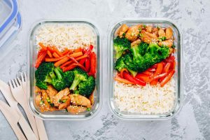 chicken teriyaki stir fry meal prep lunch box containers with broccoli, rice and carrots
